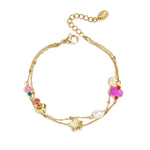 Charm bracelet with heart, flower, pearl and beads