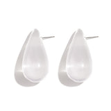 Earrings with teardrop-shaped resin studs