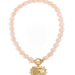 Bead necklace with front closure charm