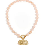 Bead necklace with front closure charm