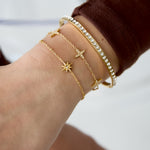 Bracelet with clover motif and inlaid clovers