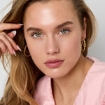 Double hoop earrings with twisted effect