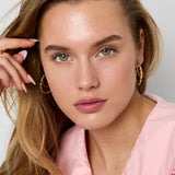 Double hoop earrings with twisted effect