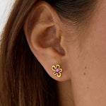 Flower-like shape stud earrings with stone detail