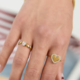 Ring with alternating hearts and cubic zirconia