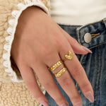 Adjustable ring with decorated heart
