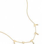 Necklace with alternating hearts and dangling stones