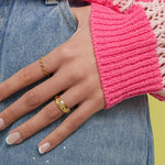 Ring with stones in clover pattern