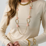 Long necklace with varying beads and shapes