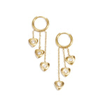 Earrings with dangling hearts at different heights