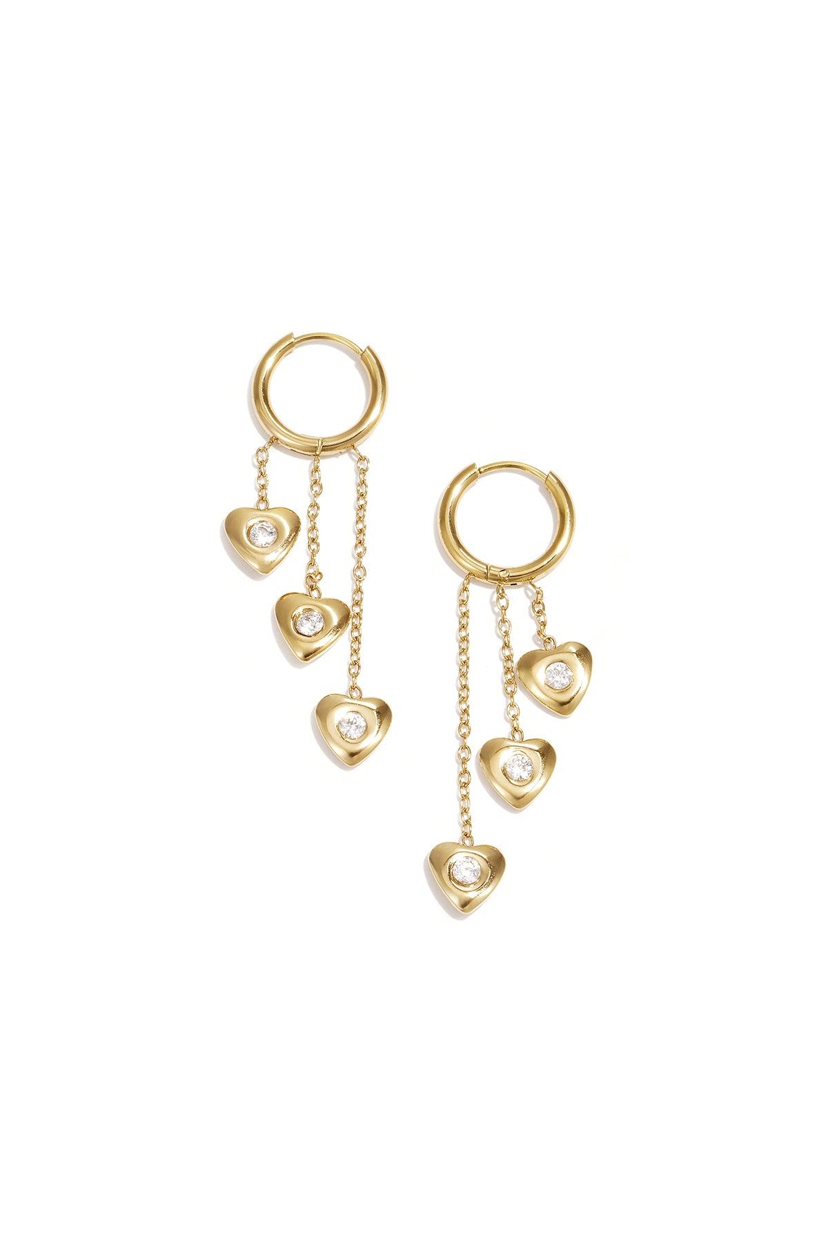 Earrings with dangling hearts at different heights