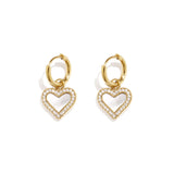 Earrings with dangling mother-of-pearl hearts