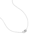 Necklace with connected heart charm