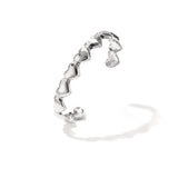 Bangle with dented hearts
