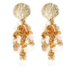 Shell earrings with hanging sequins