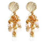 Shell earrings with hanging sequins