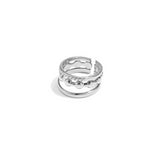 3-layer ring with round details and stones