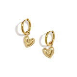 Earrings with a detailed dangling heart