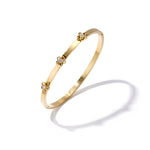 Bangle with floral detail and rhinestone