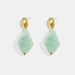 Earrings with natural stone look