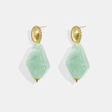 Earrings with natural stone look