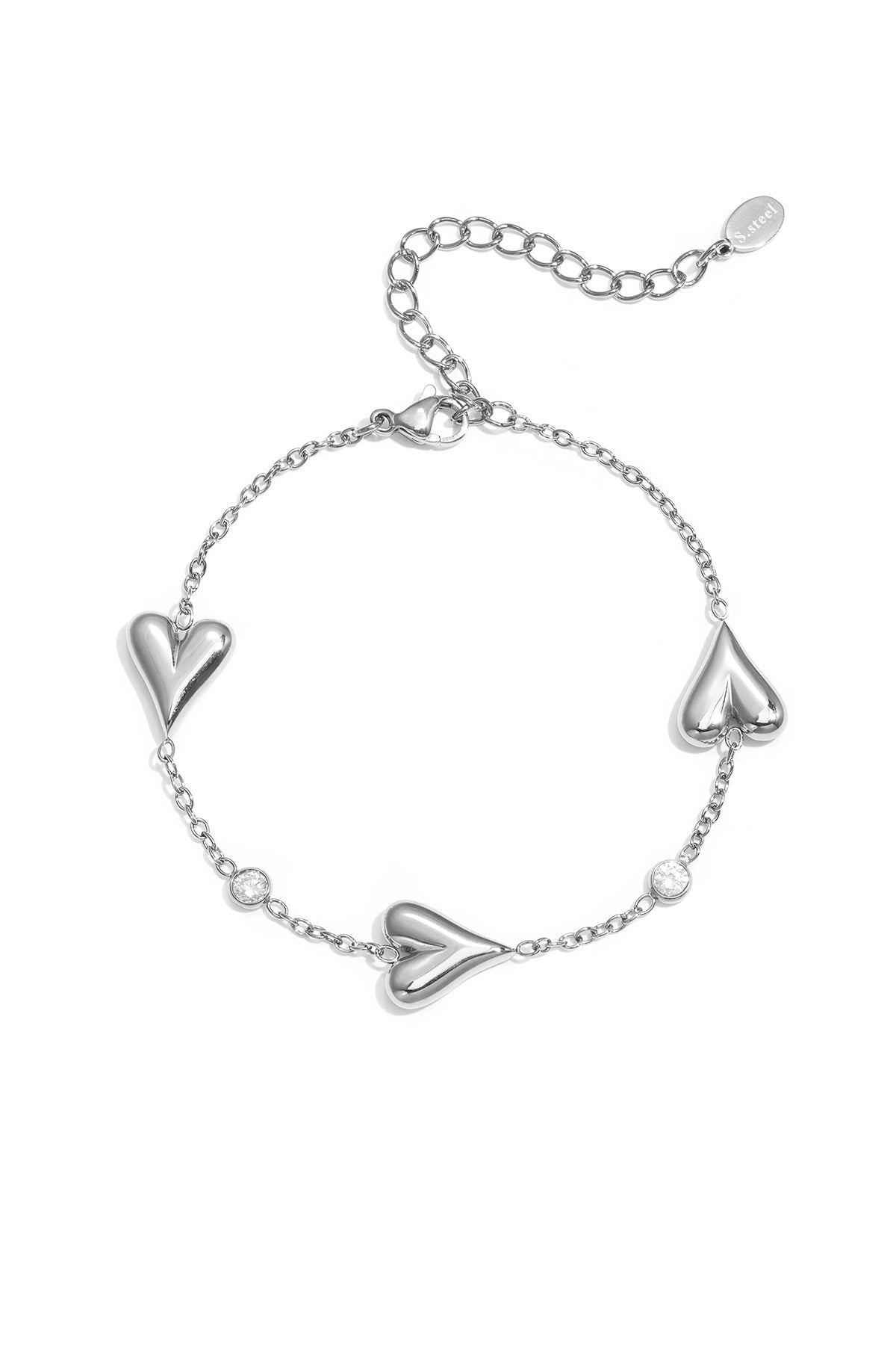 Bracelet with three solid hearts and stones
