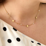 Necklace with clovers and round cubic zirconia stones