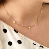 Necklace with clovers and round cubic zirconia stones