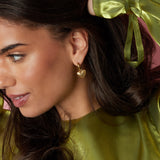 Earrings with radiant heart