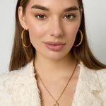 Necklace with hanging flower charm