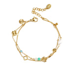 Bracelet with clover, beads and stones
