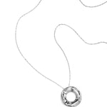 Long necklaces with a round pendant with a bumpy texture
