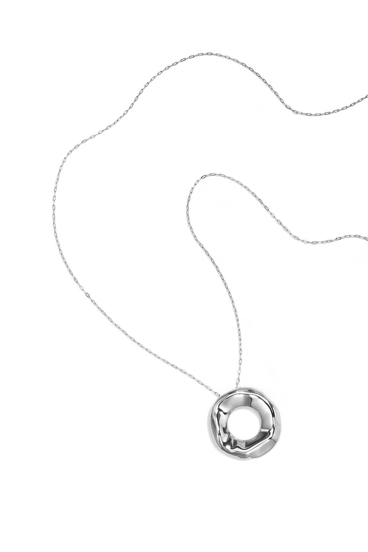 Long necklaces with a round pendant with a bumpy texture