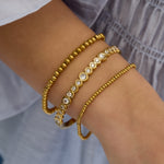 Bangle bracelet round stones