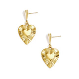Earrings with heart-shaped pendants