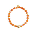 Beaded bracelet with heart-shaped centerpiece