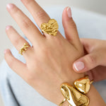 Cuff statement bracelet with organic shapes