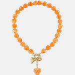 Bead necklace with hanging heart charms